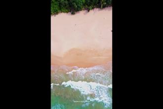 make a happy birthday drone video in the beach very romantic