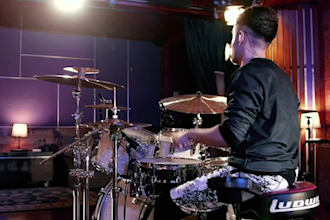 record drum tracks in a recording studio