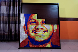 make portrait art video with 900 rubiks cubes