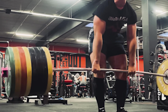 create a custom powerlifting program and provide coaching
