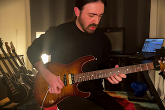 give you online guitar lessons on your journey as a musician