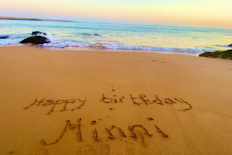 write any message or name on a tropical beach sand