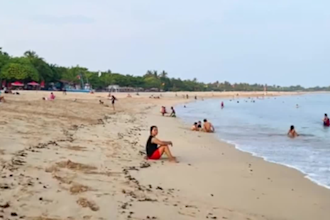 create a 4k walking video at various beaches in bali