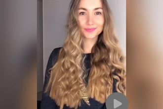 be a female photo and video model with long hair