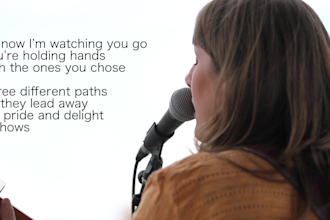 write and record a custom song on vocals and acoustic guitar