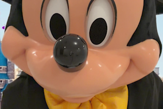 create a custom mickey mouse video message in full costume and voice