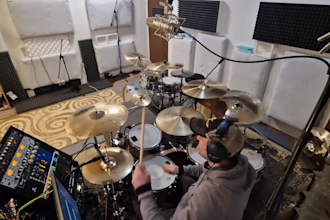 track drums in a pro studio designed for drum tracking and mixing