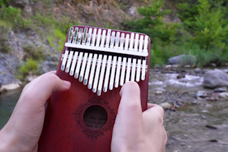 play pop melodies on kalimba