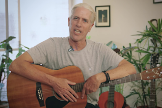 give you guitar lessons