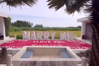 create valentine wish in swimming pool with flowers