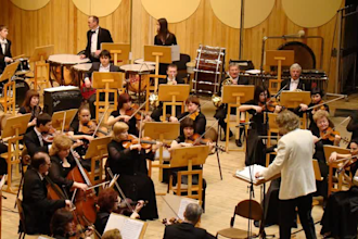 composing and arranging for orchestra and ensemble