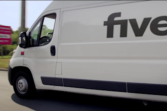 create a realistic logistics video with a truck with the company logo