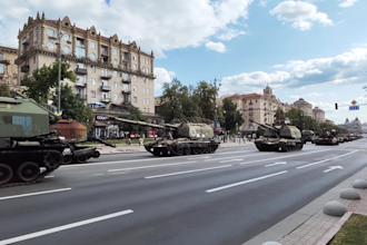 exclusive a parade of battered vehicles  in kyiv