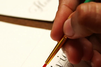 create handwritten wedding place cards in modern calligraphy