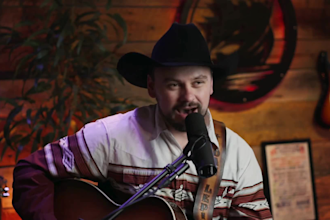 be your nostalgic small town country singer songwriter