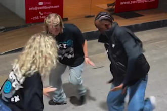 perform an energetic amapiano group dance to your song