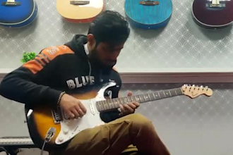 teach you guitar lessons online from beginners to pros