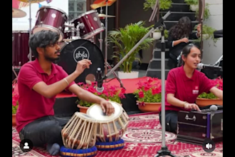 play indian classical instrument called tabla
