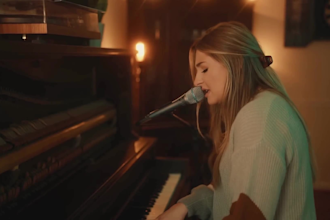 write, sing heartfelt country holiday song with acoustic guitar
