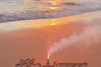 write your custom birthday wish on beach sand as a video