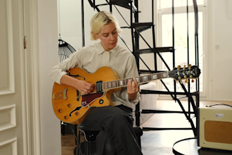 give you lessons in guitar, composition and music theory