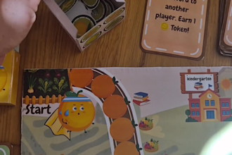 design a complete printable board game package for kids