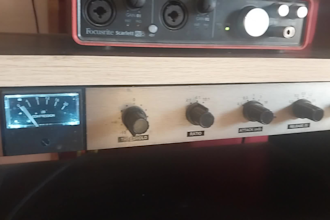 run your mix through my SSL bus compressor hardware