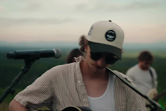 produce country music with male rock vocals and songwriting