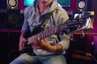 session bassist records bass lines for productions