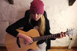 teach you any song on acoustic or electric guitar