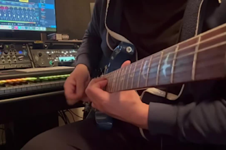provide professional acoustic or electric guitar tracks