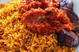 cook delicious jollof rice and chicken