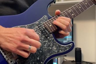 compose and record a tasteful guitar solo or rhythm