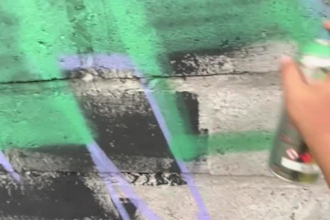 make real graffiti and mural on the street wall