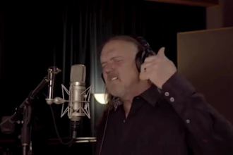 be your professional male country singer with acoustic guitar