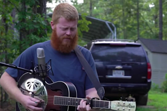 deliver heartfelt country folk singer songwriter song with acoustic guitar