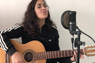 give you guitar lessons