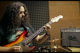 give you guitar lessons