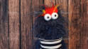 create a fun video with a blue hairy monster puppet