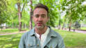 be male video spokesperson in english using my iphone 13 in the park