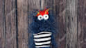 create a fun video with a blue hairy monster puppet