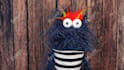 create a fun video with a blue hairy monster puppet