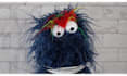 create a fun video with a blue hairy monster puppet