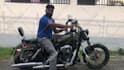 be your spokesperson sitting on harley davidson motorcycle