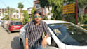 record video at street next to car