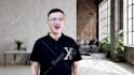 make a chinese female spokesperson video in real office background