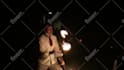with fireworks on my head, juggle 3 fire clubs