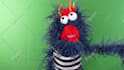 create a fun video with a blue hairy monster puppet