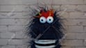create a fun video with a blue hairy monster puppet