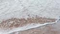 write your message creatively on a beach as  video or photo
